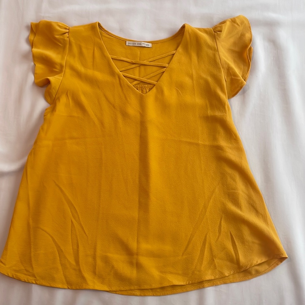 Criss-cross V-neck ruffle sleeve tank